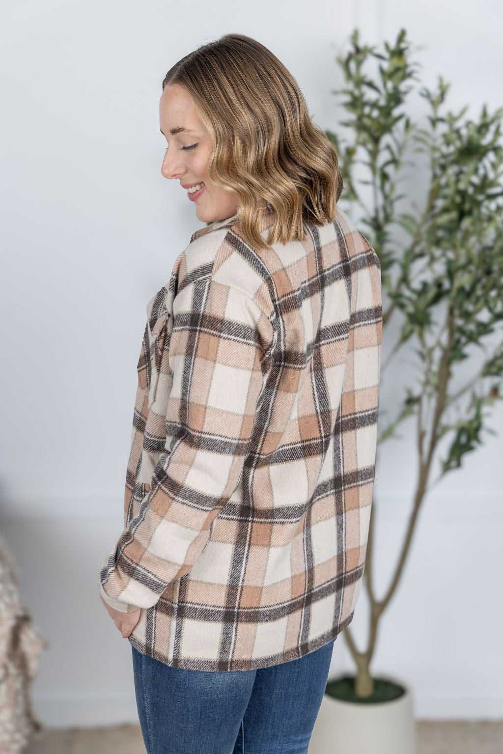 Norah Plaid Shacket in Beige plaid with snap button front and chest pockets.