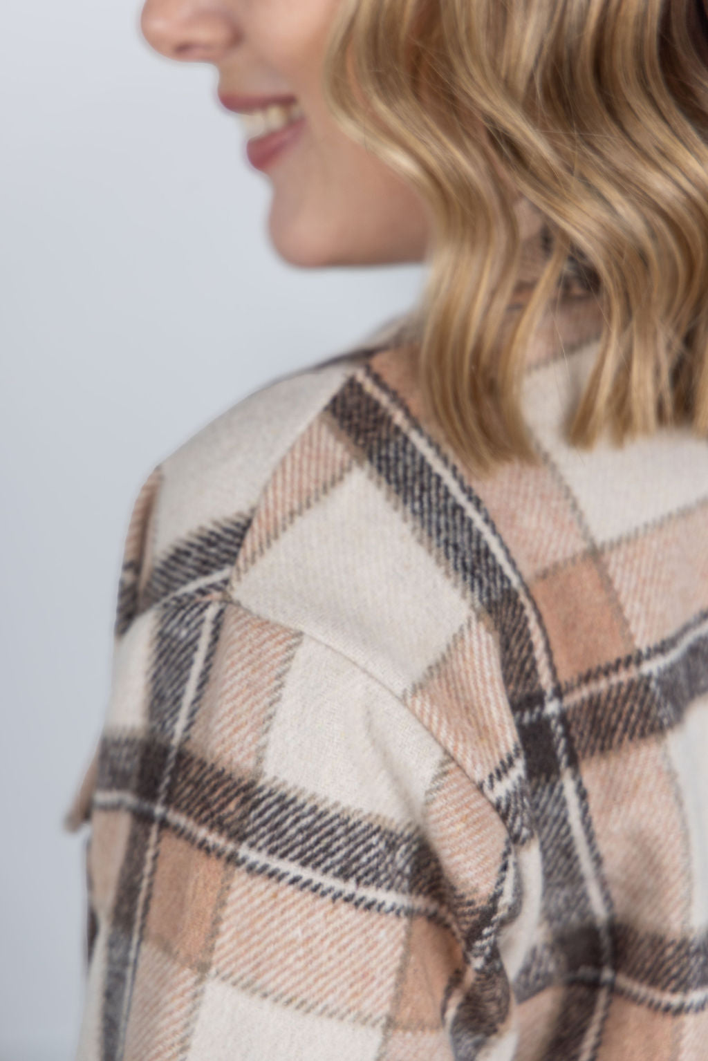 Norah Plaid Shacket in Beige plaid with snap button front and chest pockets.
