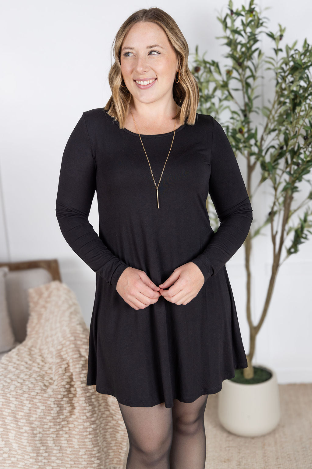 Savannah Bamboo Swing Dress in black with long sleeves and scoop neckline.