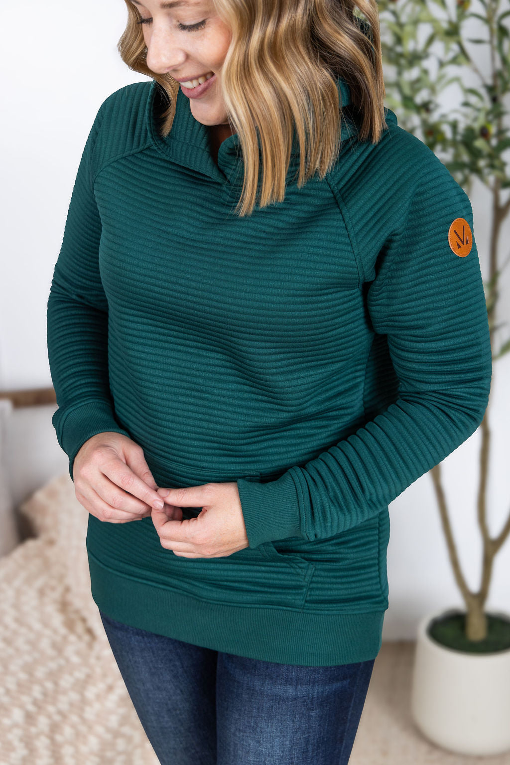 Tatum Pullover Hoodie in hunter green with ribbed texture and kangaroo pocket