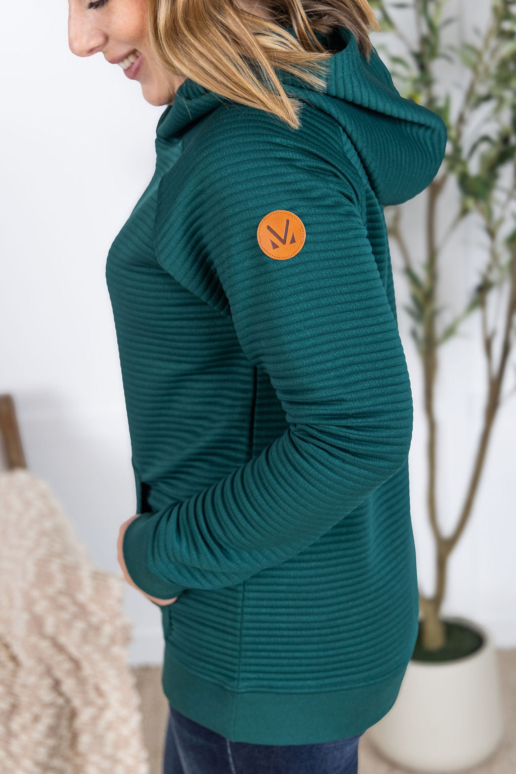 Tatum Pullover Hoodie in hunter green with ribbed texture and kangaroo pocket