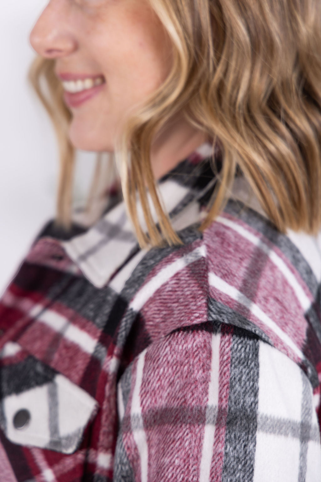 Norah Plaid Shacket in deep wine plaid with snap button closure.