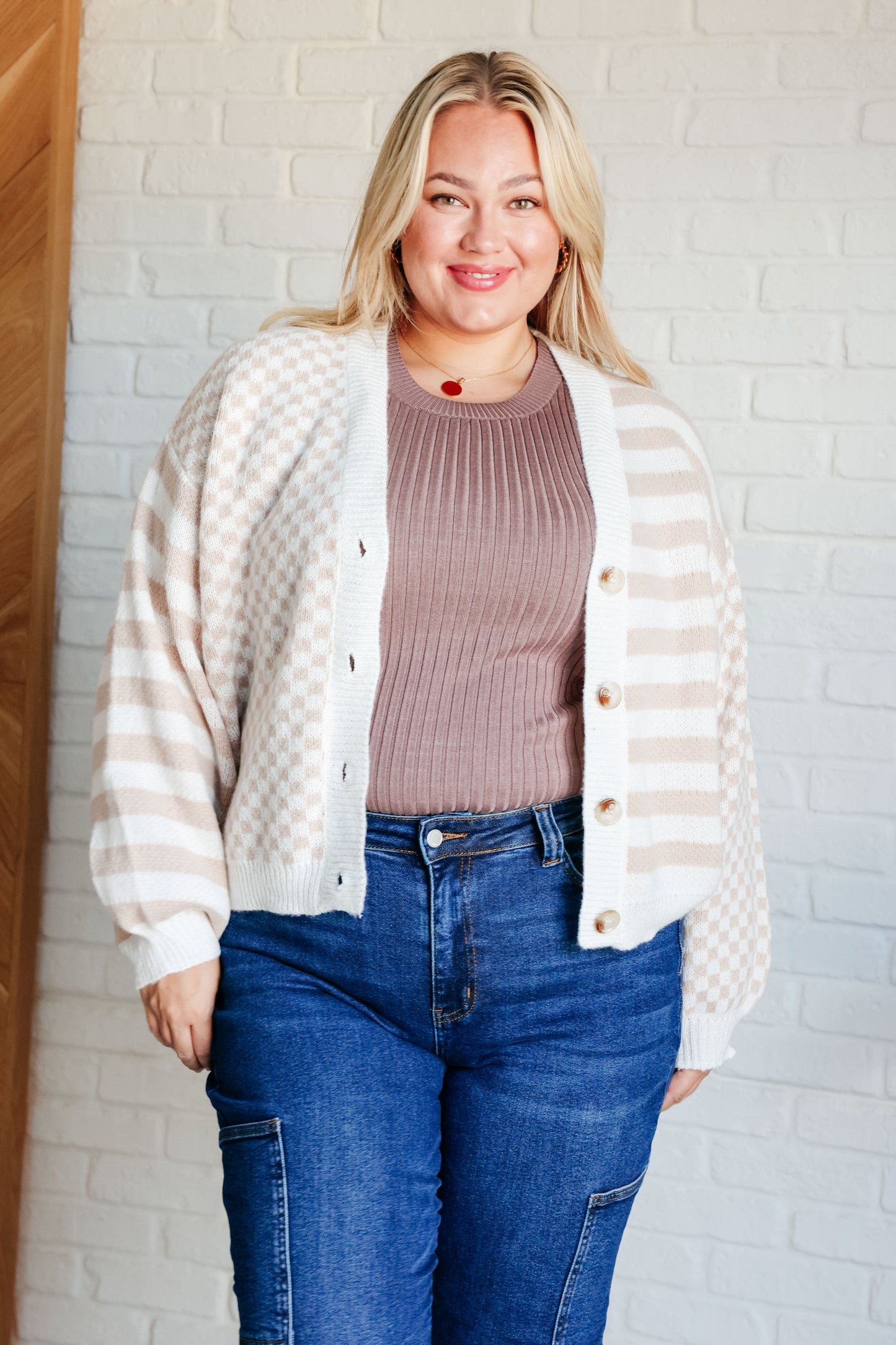 Neutral check stripe cardigan with beige and ivory pattern and button front