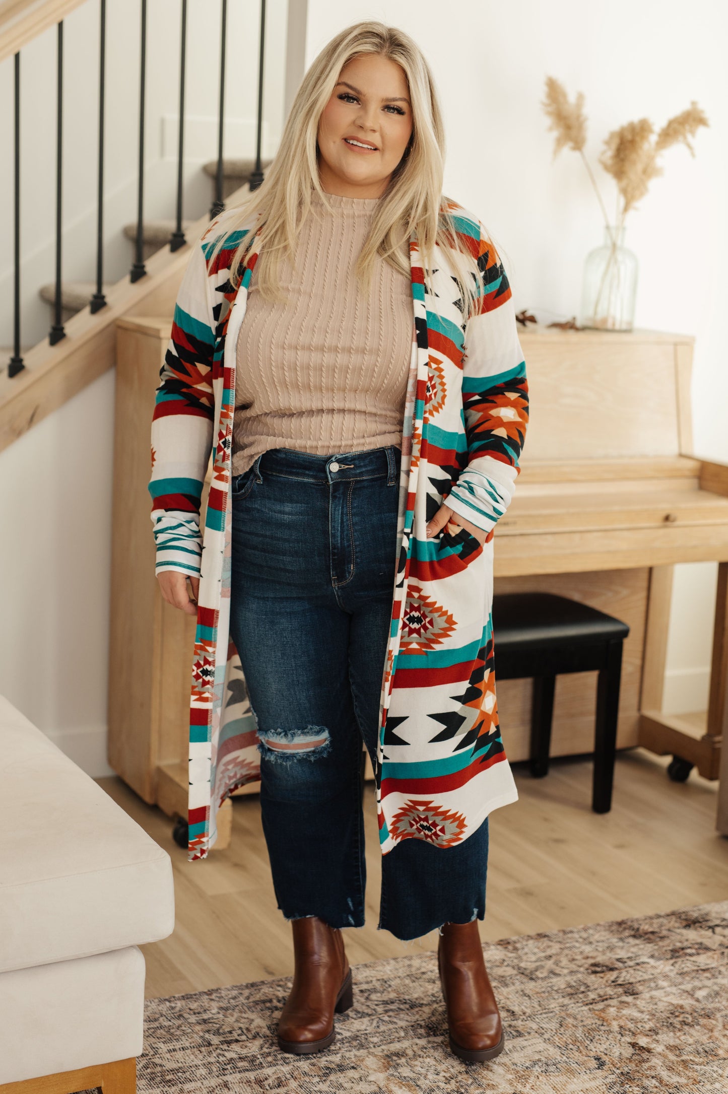 Woman wearing the Winding Down Cable Detail Top in soft textured knit with raglan sleeves.