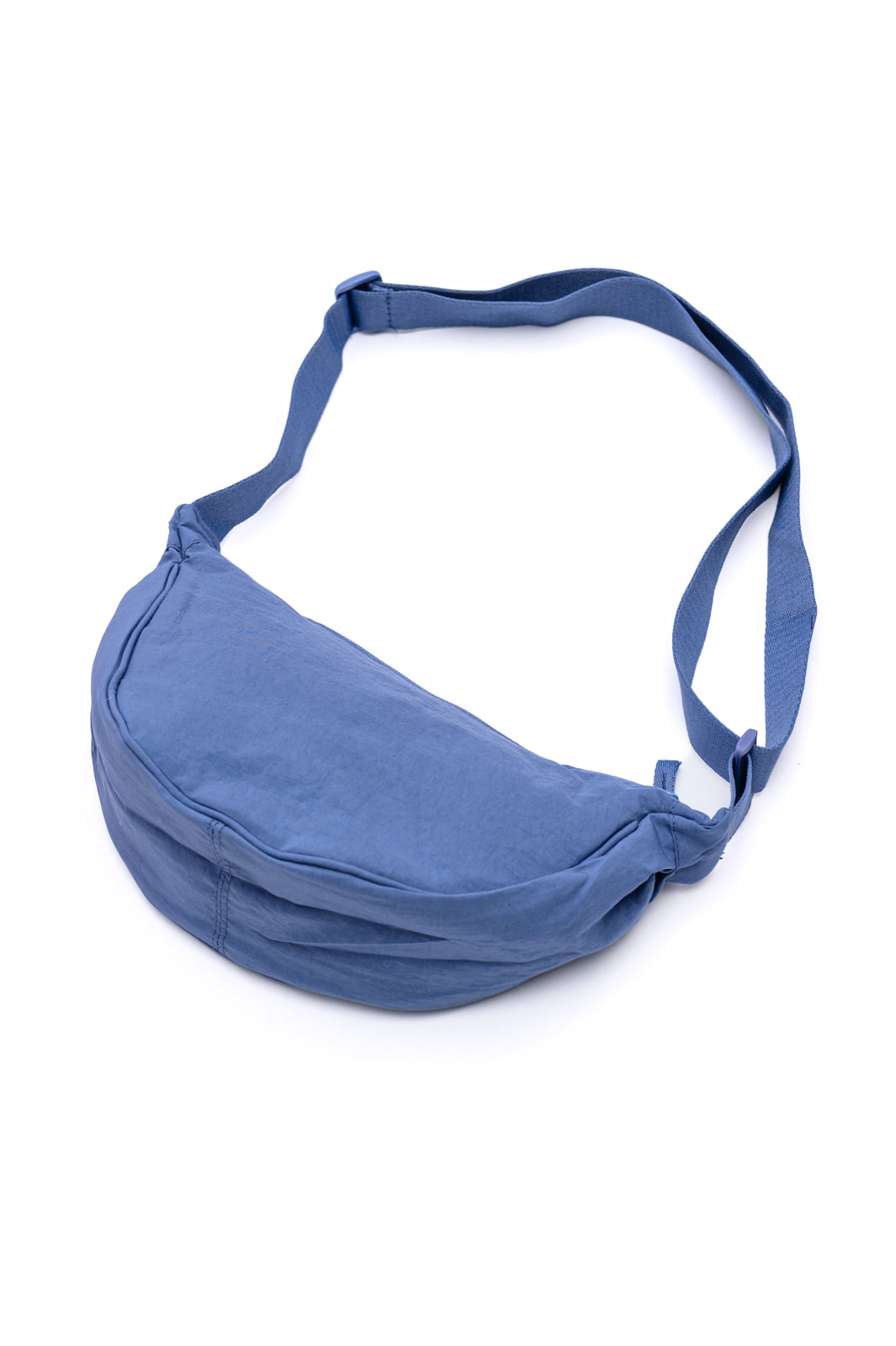 Dusty blue nylon mini crossbody bag with round dumpling shape and zipper closure