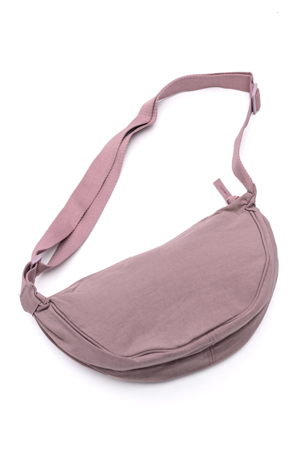 Lavender mini crossbody bag with dumpling silhouette and zipper closure