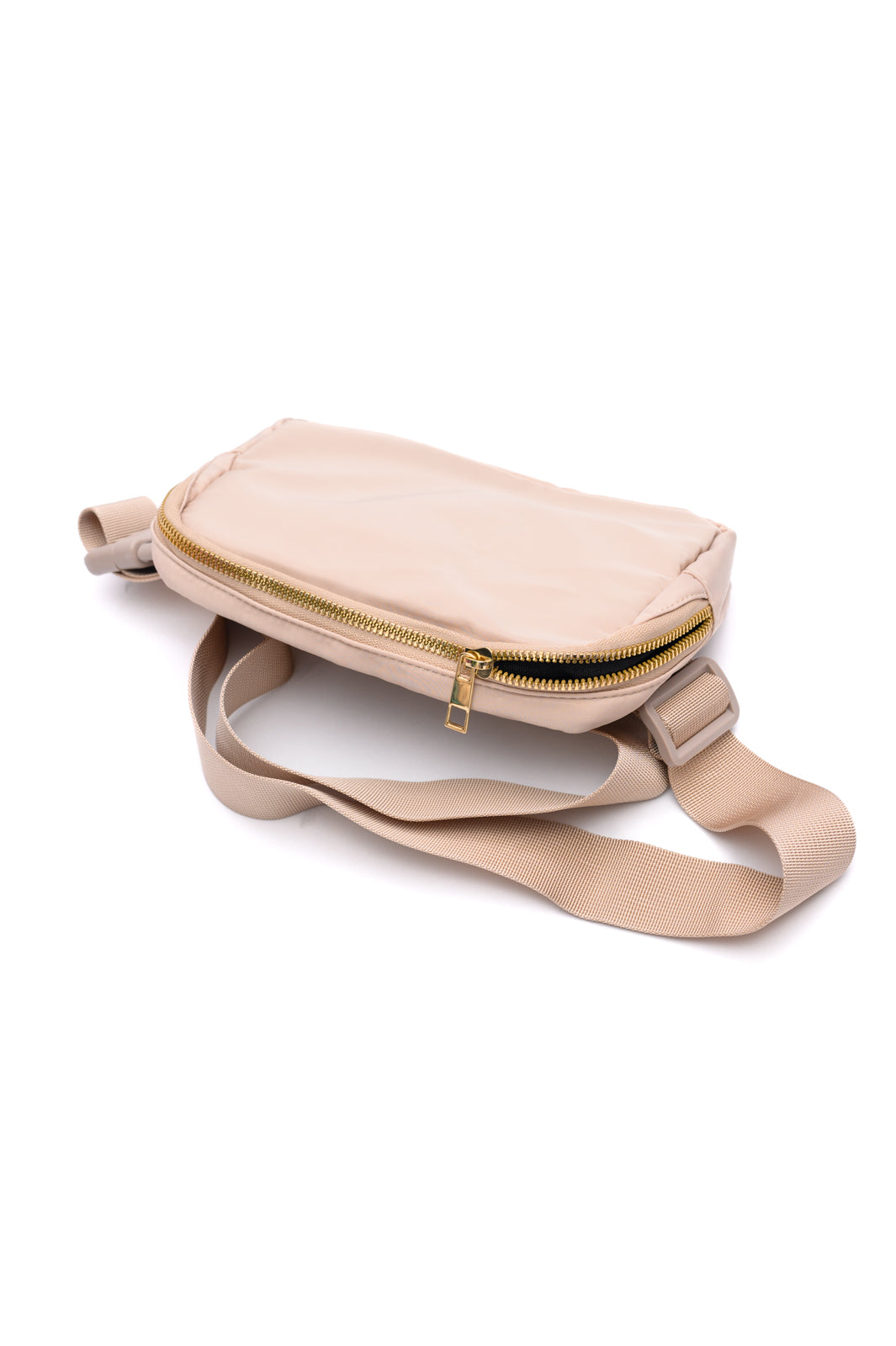 Khaki crossbody belt bag with gold hardware and adjustable strap