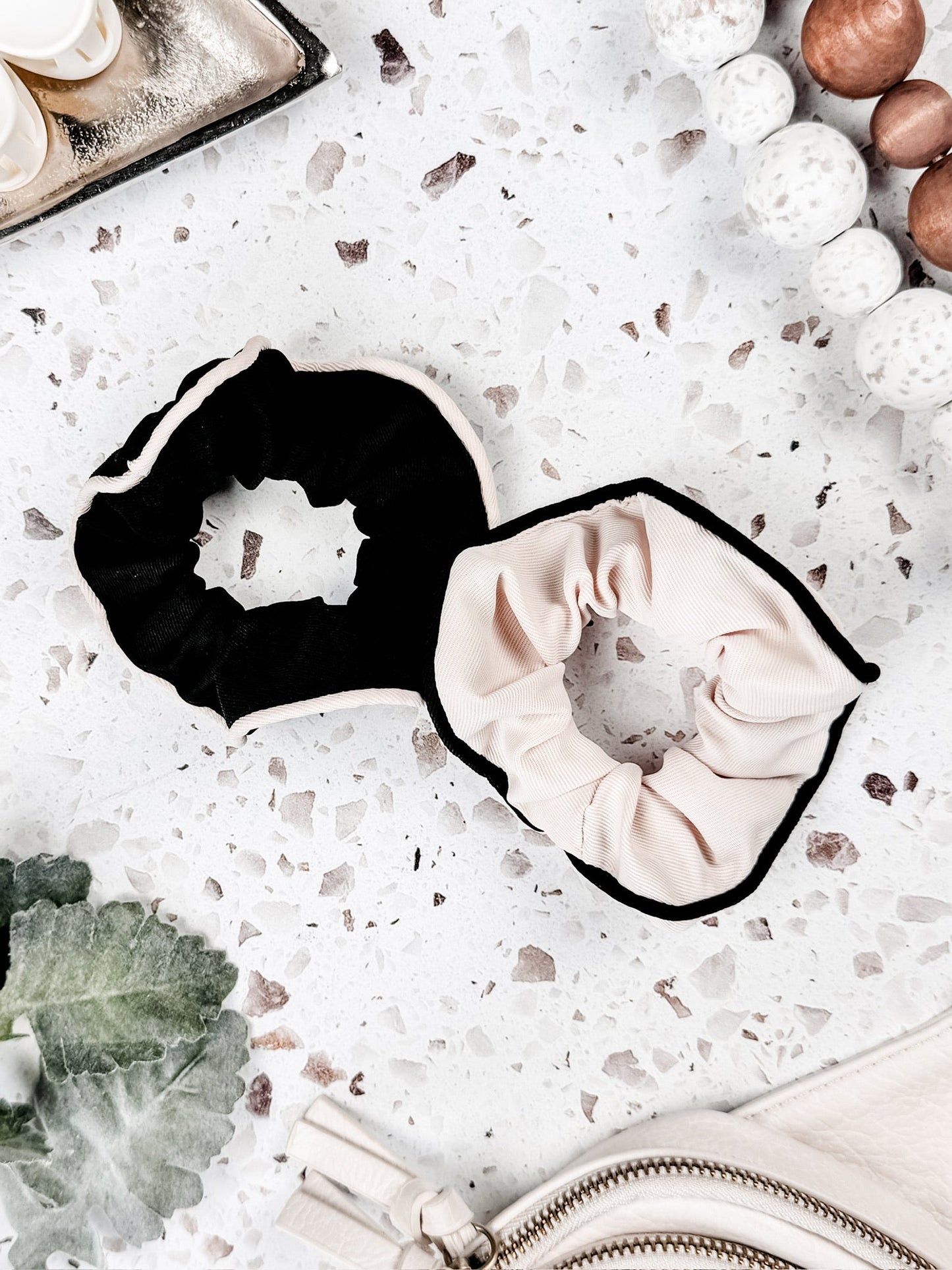 Set of two neutral scrunchies with ribbed fabric and contrast trim