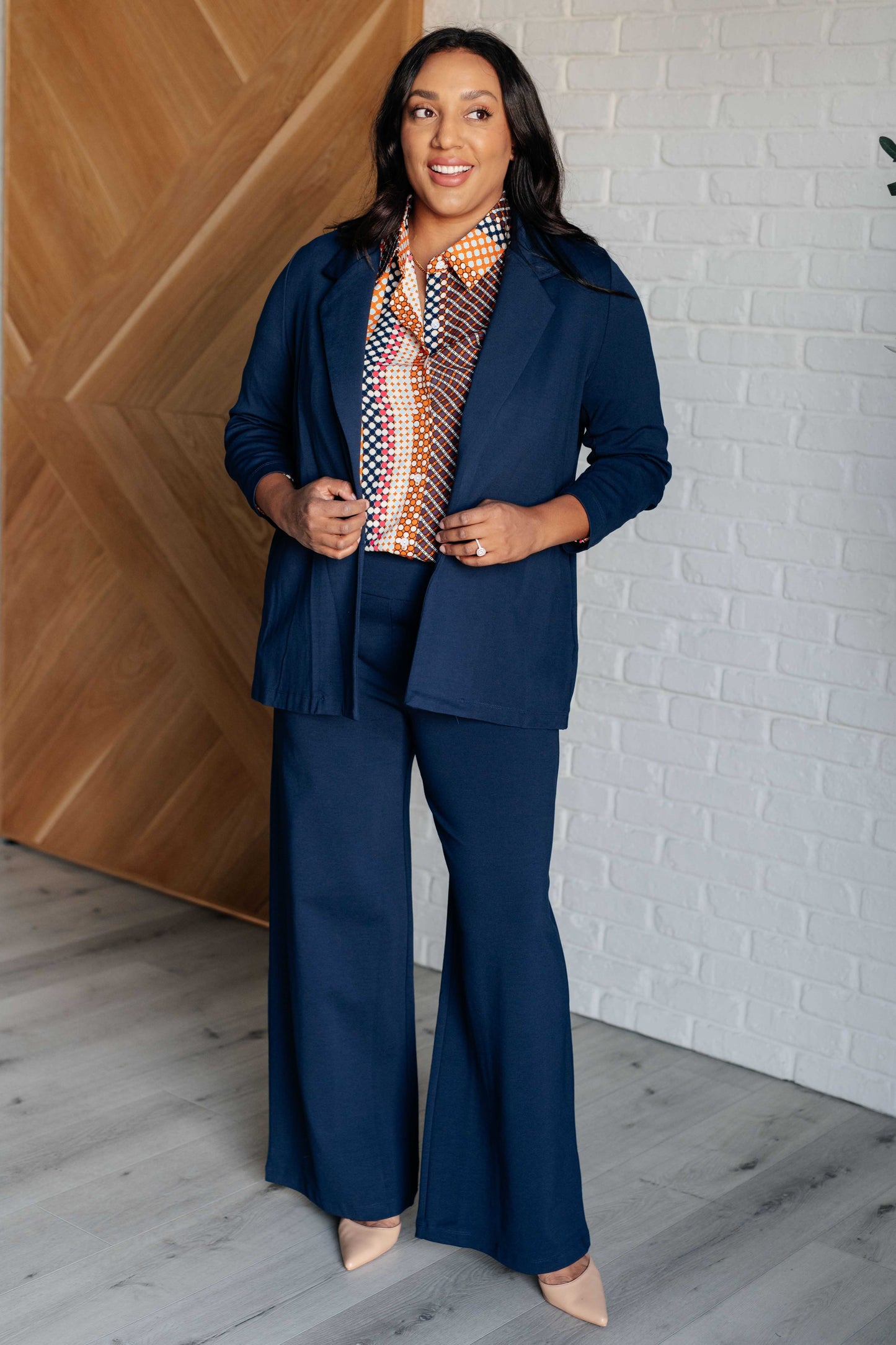 Polka Dot Poplin Top with collared neckline, button front, and balloon sleeves