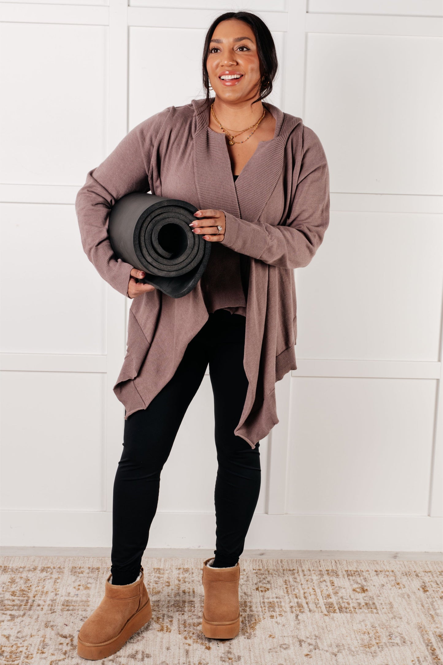 Woman wearing the You’ve Got Options Cardigan in taupe with hood, ribbed knit accents, and waterfall hem.