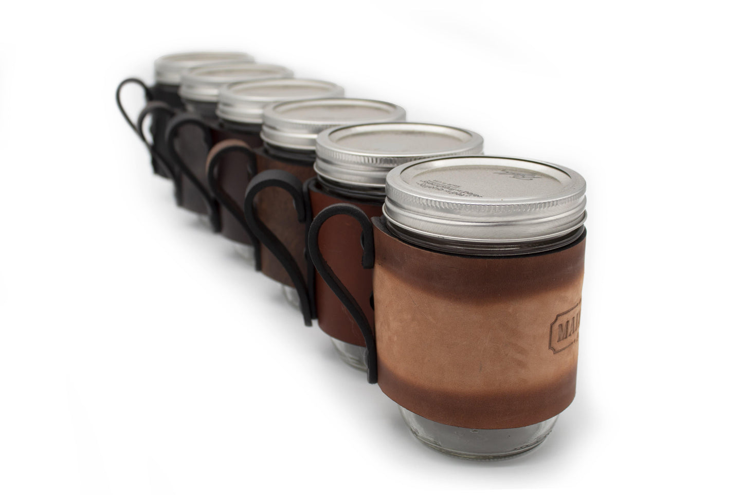 Leather mason jar sleeve with handle in brown, gray, and black full-grain leather, handmade in USA by Main Street Forge