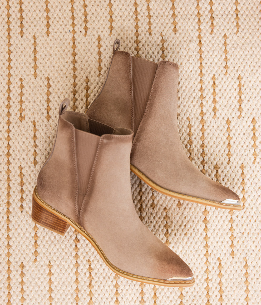 Wylie taupe suede ankle boots with pointed toe, block heel, and silver toe accent