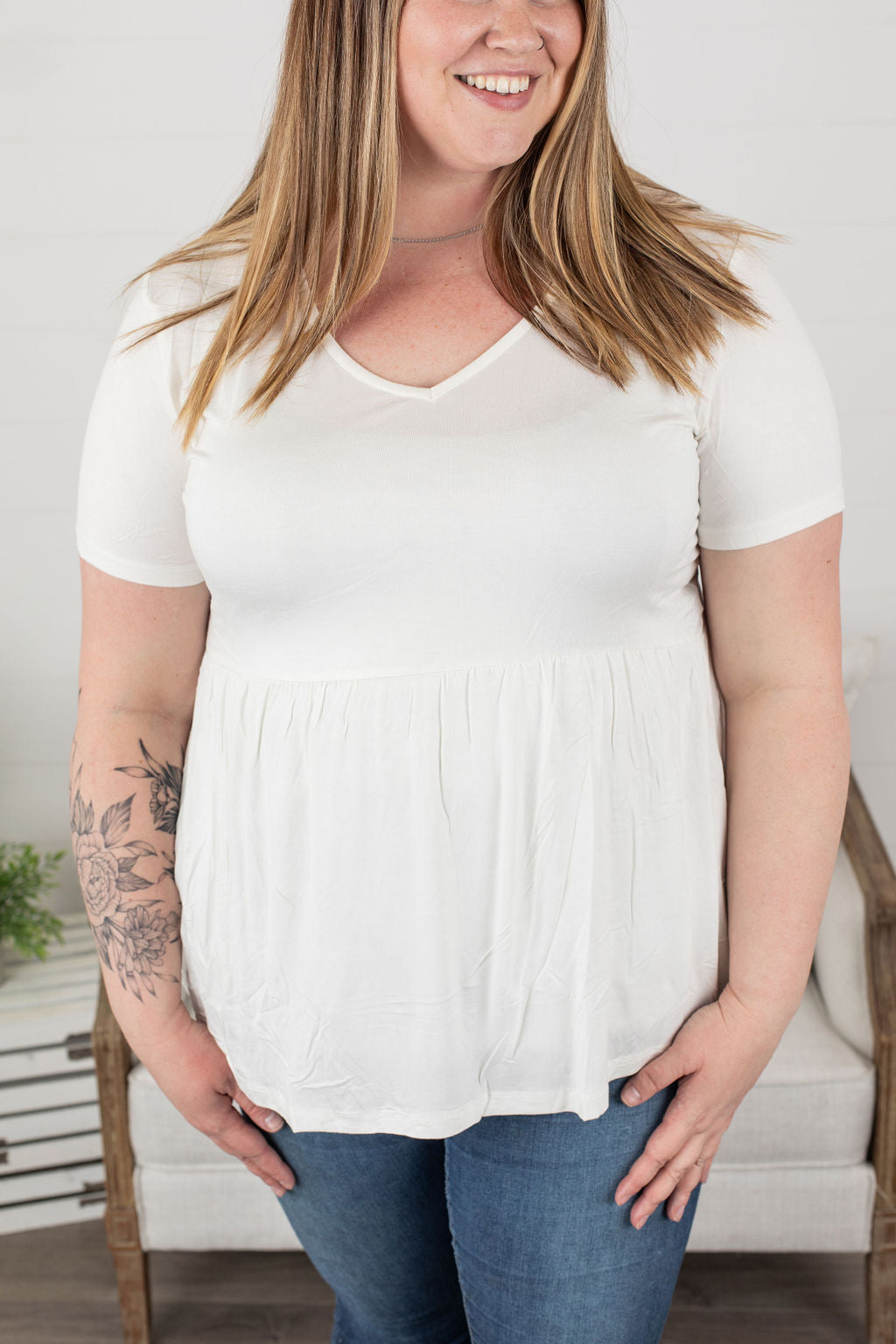 Michelle Mae Sarah Ruffle Top in Ivory with short sleeves and flowy fit