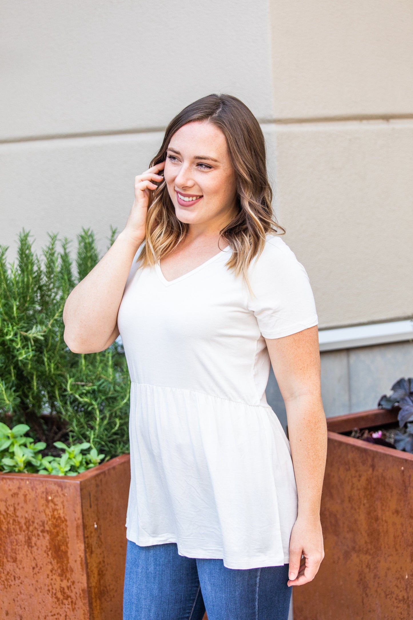 Michelle Mae Sarah Ruffle Top in Ivory with short sleeves and flowy fit