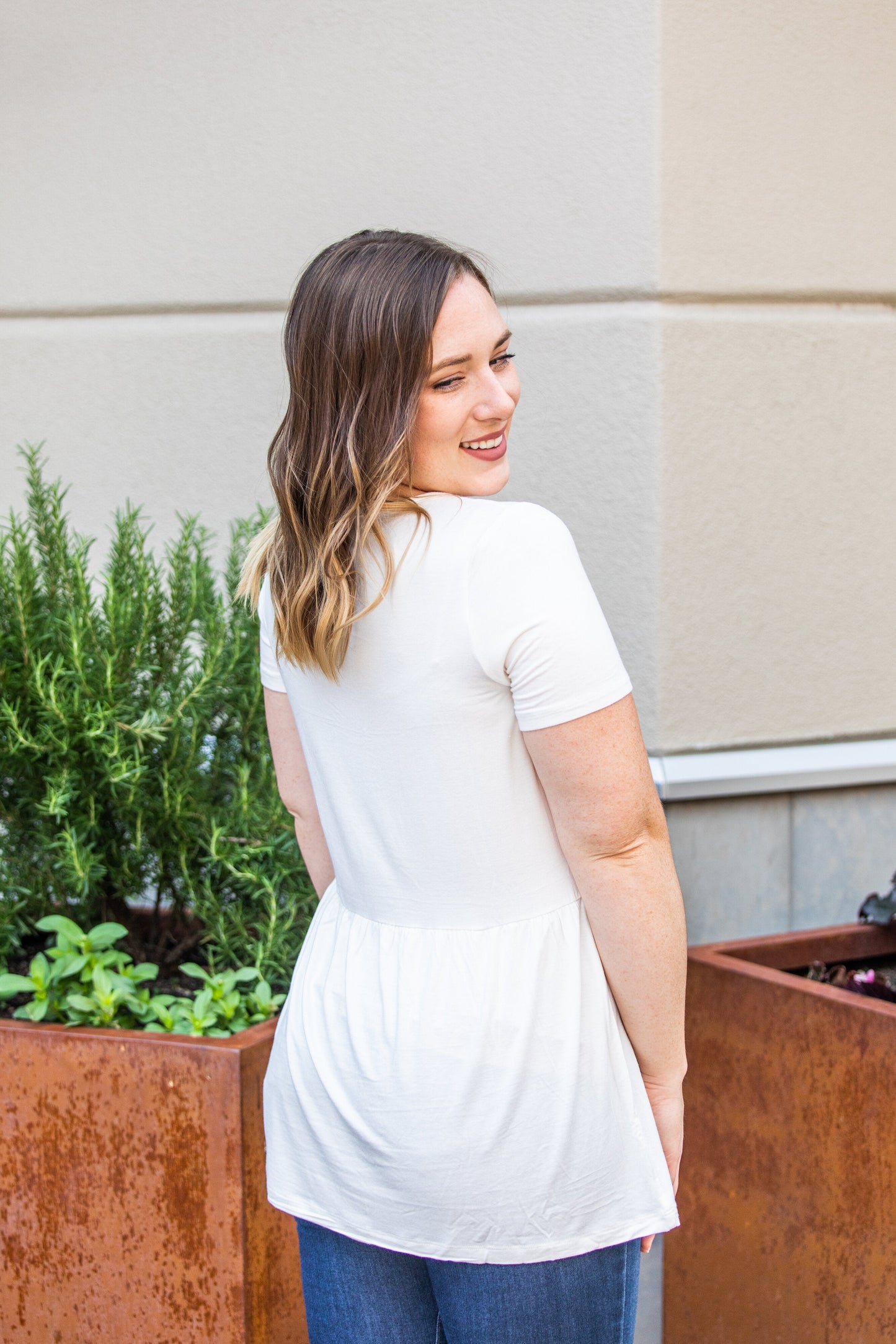 Michelle Mae Sarah Ruffle Top in Ivory with short sleeves and flowy fit