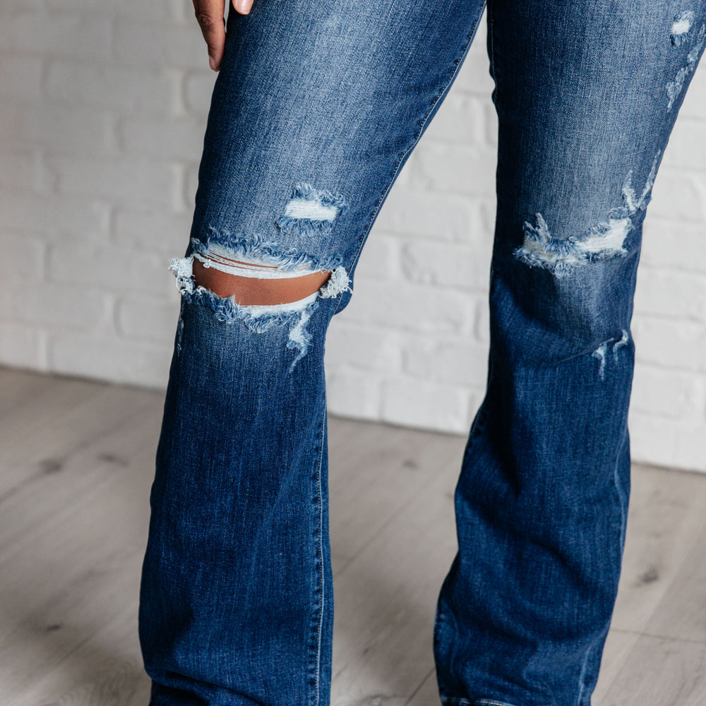 
                      
                        Mila Mid Rise Distressed Bootcut Jeans
                      
                    