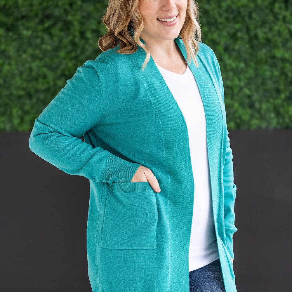 
                      
                        High Pocket Cardigan - Teal FINAL SALE
                      
                    