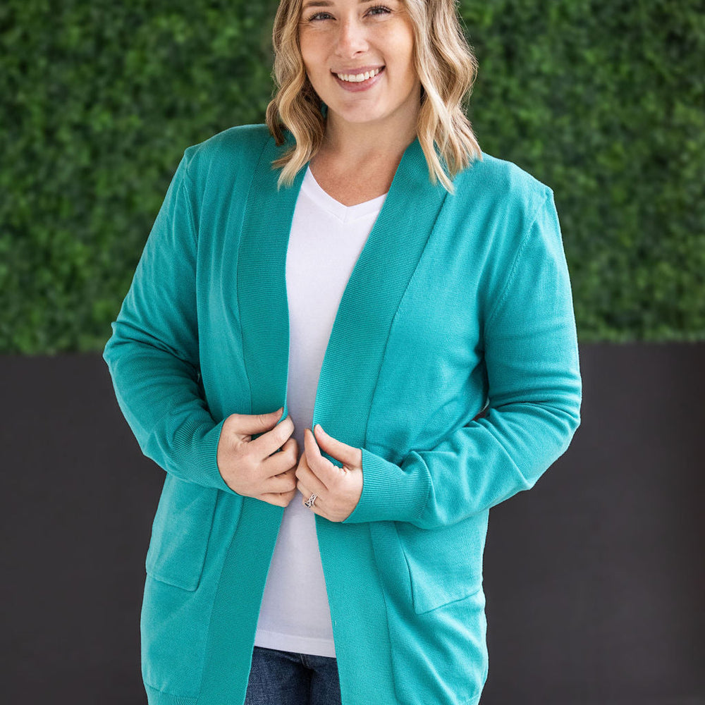 
                      
                        High Pocket Cardigan - Teal FINAL SALE
                      
                    