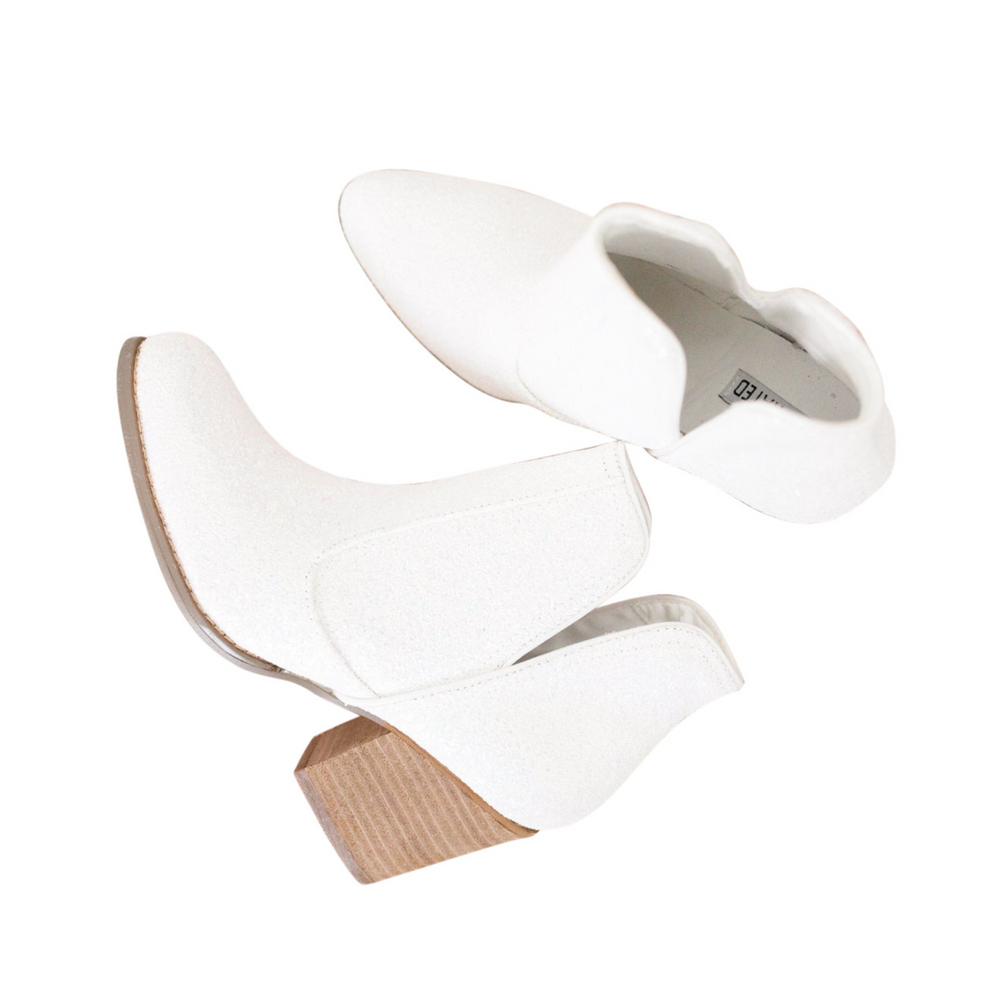 
                      
                        Fiera Booties in White
                      
                    