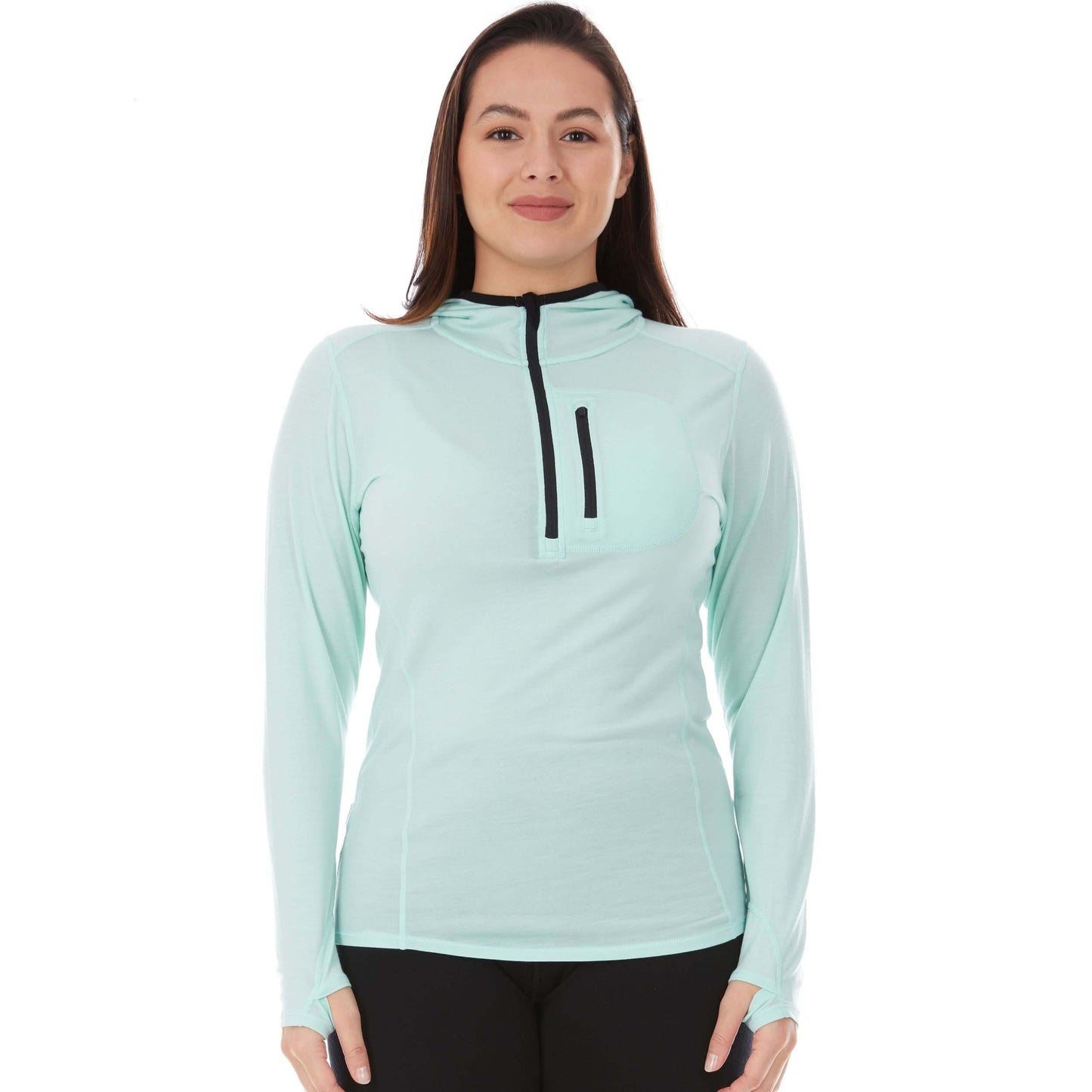 Woman wearing mint merino wool 1/4 zip sun hoodie with hood and thumbholes