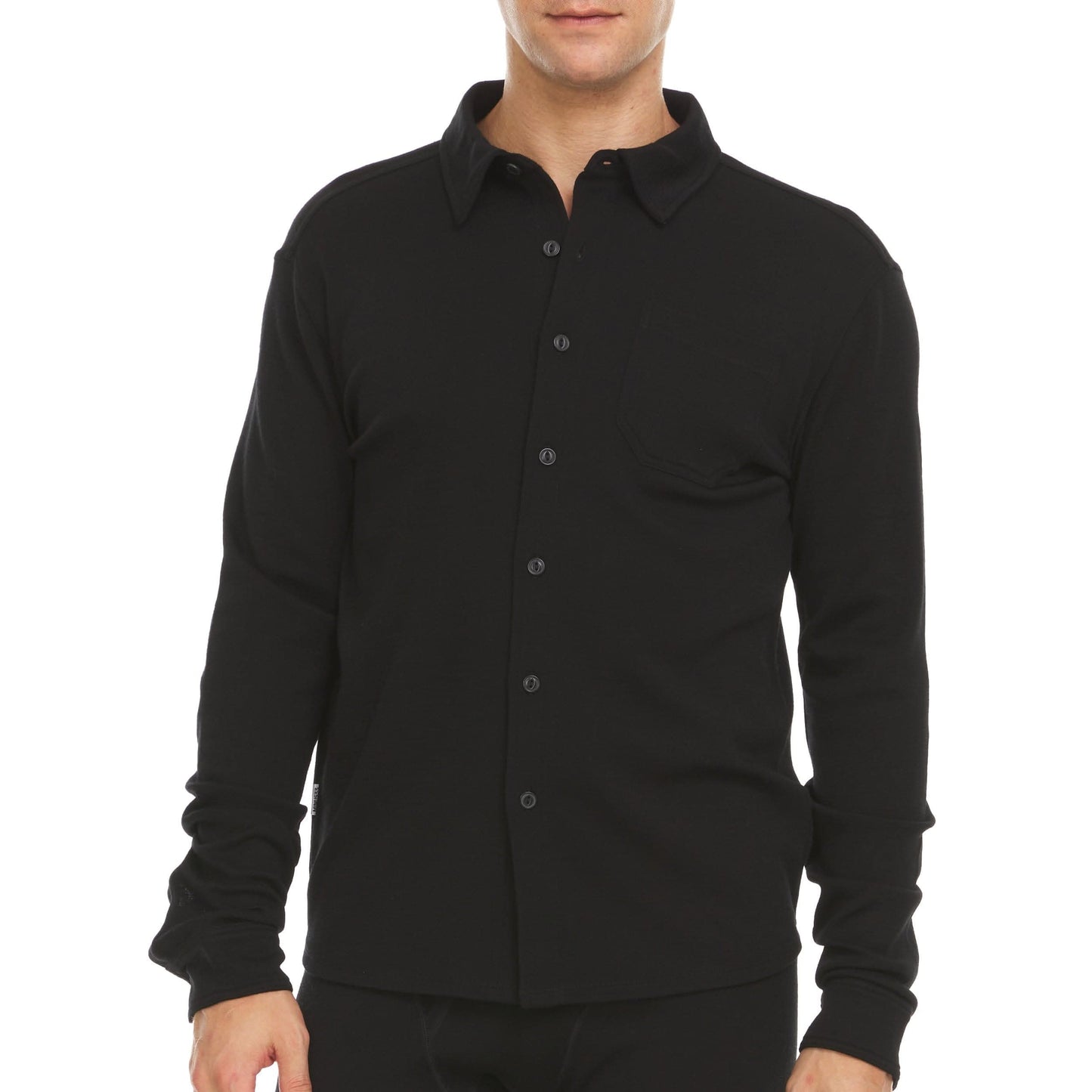 Man wearing black merino wool button up shirt with chest pocket