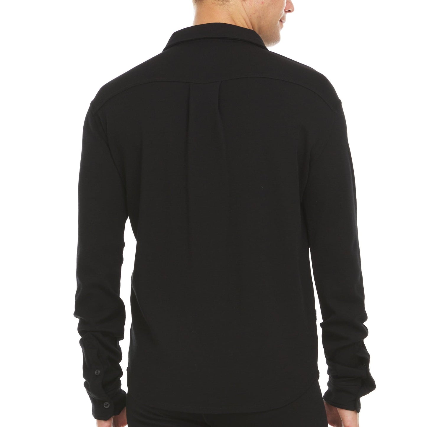 Man wearing black merino wool button up shirt with chest pocket