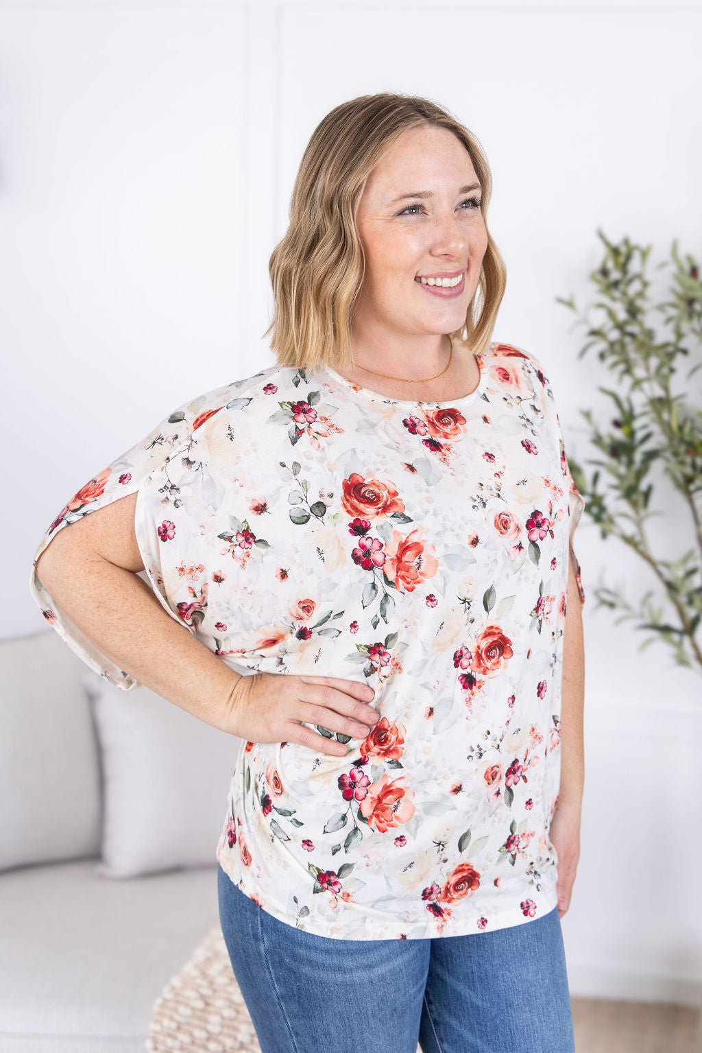 Darcy Dolman Top in Pink Bloom floral with relaxed dolman sleeves.