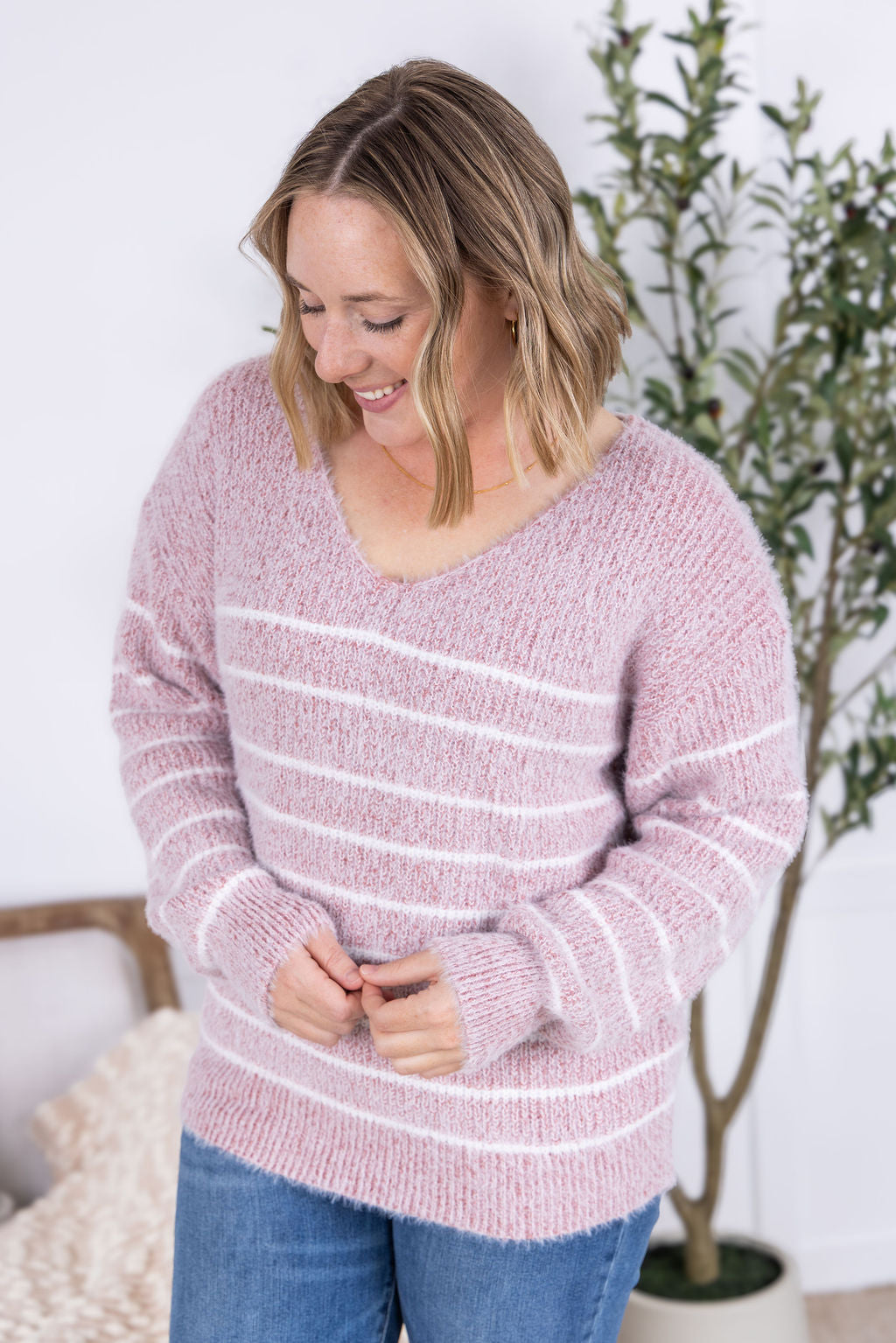 Cozy Striped Sweater in Mauve with white stripes, v-neckline, and relaxed fit.