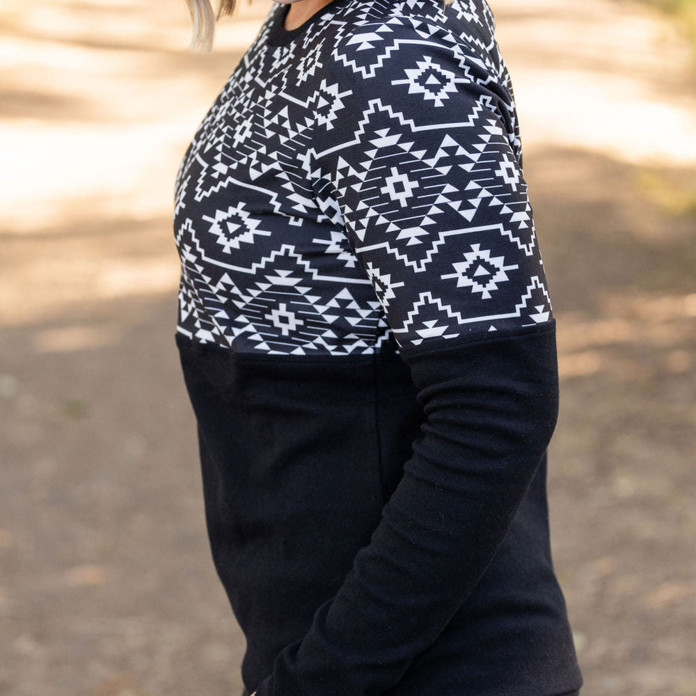 
                      
                        Natalie Pullover - Black Geometric
                      
                    