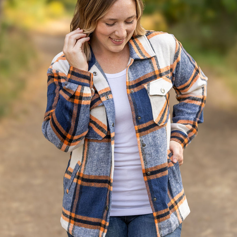 
                      
                        Norah Plaid Shacket - Navy and Orange
                      
                    