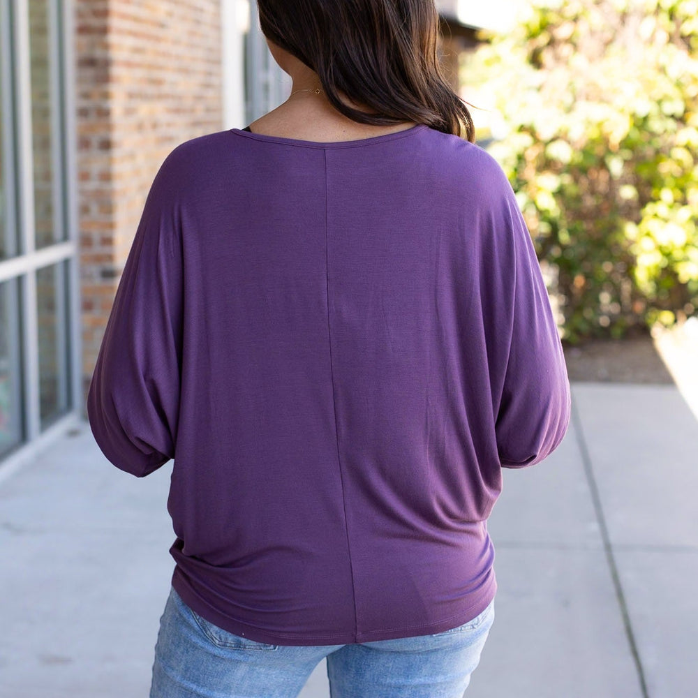 
                      
                        Darcy Dolman Top- Dark Purple
                      
                    