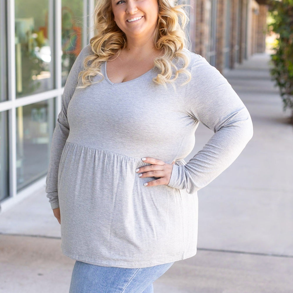 
                      
                        Long Sleeve Sarah Ruffle - Light Grey
                      
                    