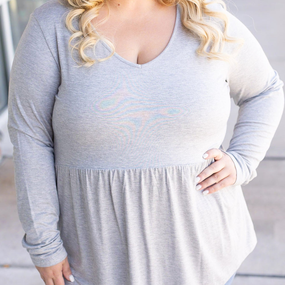 
                      
                        Long Sleeve Sarah Ruffle - Light Grey
                      
                    