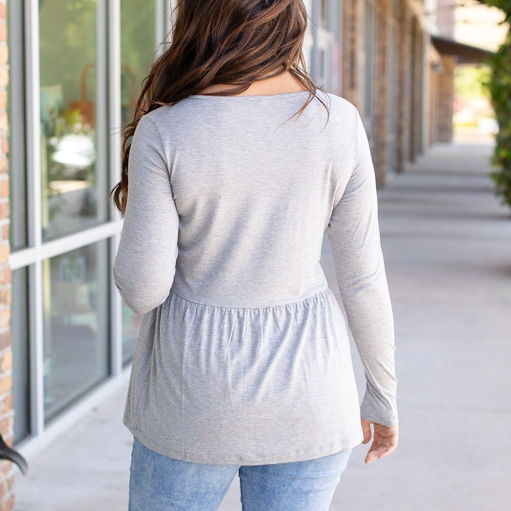 
                      
                        Long Sleeve Sarah Ruffle - Light Grey
                      
                    