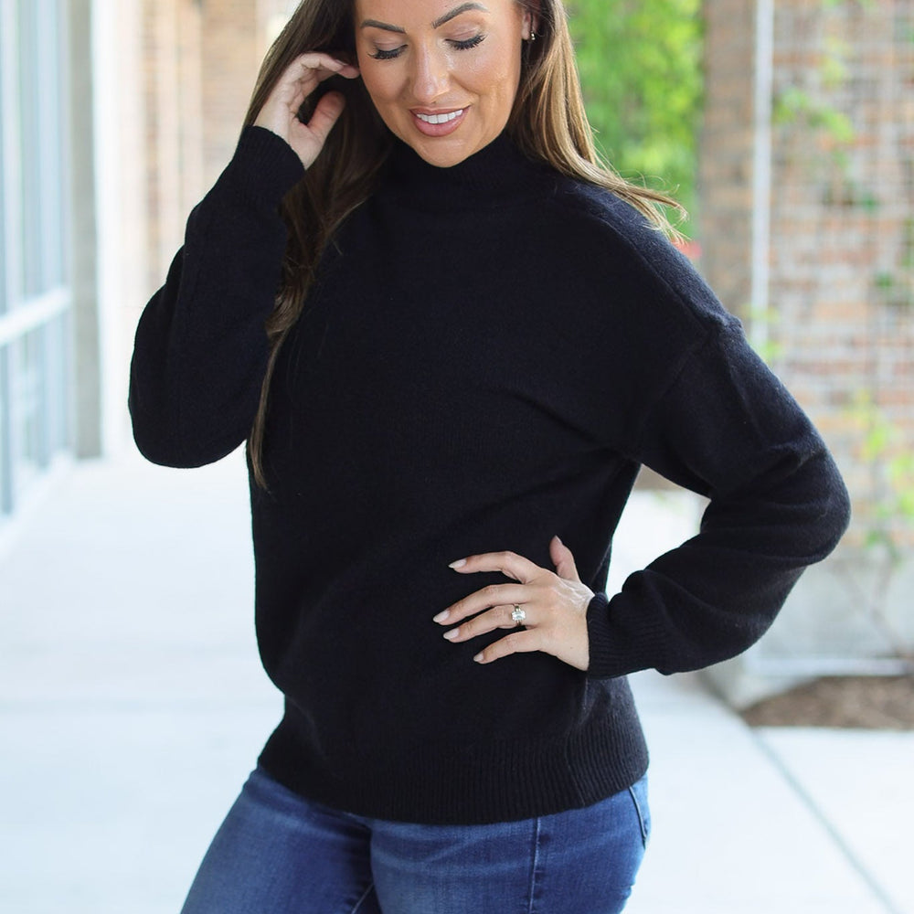 
                      
                        Molly Sweater - Black
                      
                    