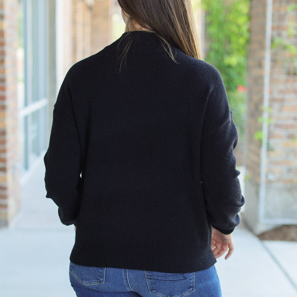 
                      
                        Molly Sweater - Black
                      
                    