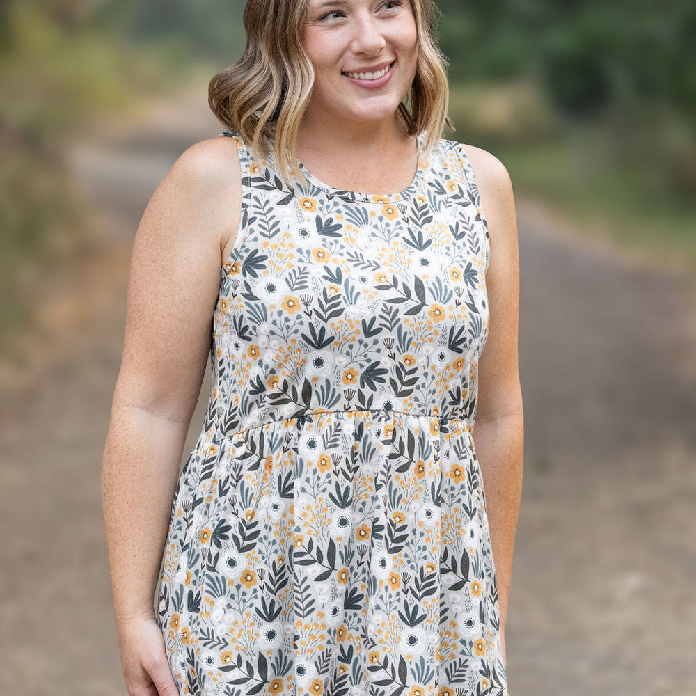 
                      
                        Renee Ruffle Tank - Boho Olive Floral
                      
                    