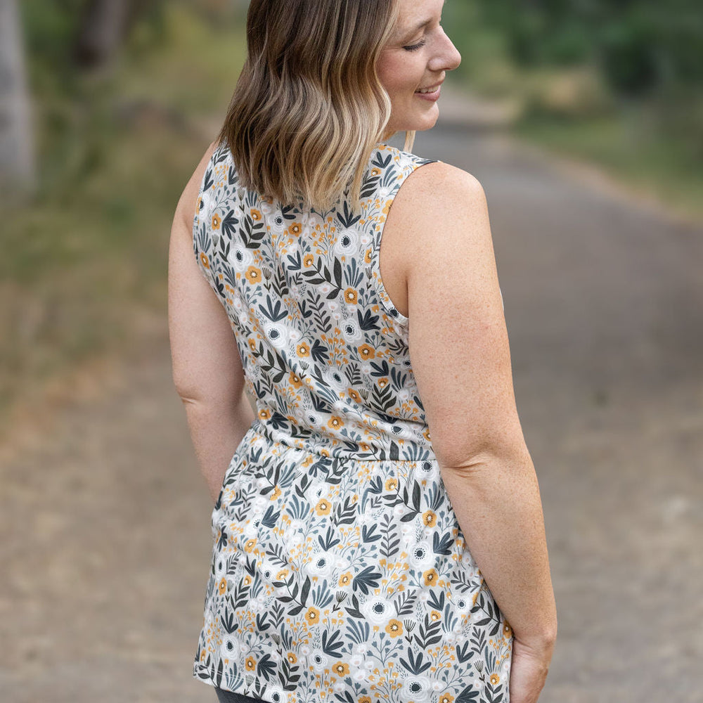 
                      
                        Renee Ruffle Tank - Boho Olive Floral
                      
                    