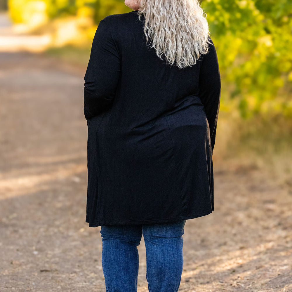 
                      
                        Classic Cardigan - Black
                      
                    