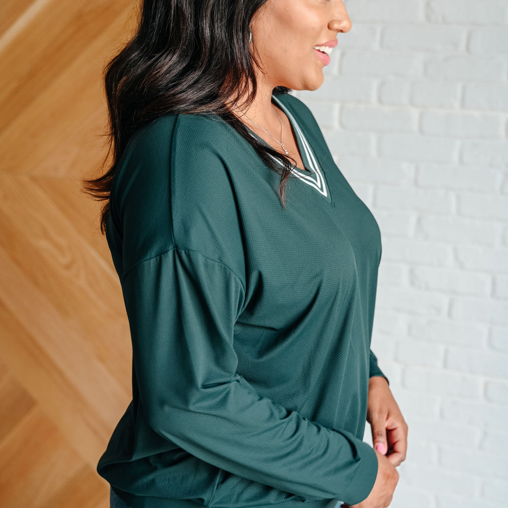 
                      
                        All Out Comfort V-Neck Pullover in Midnight Green
                      
                    