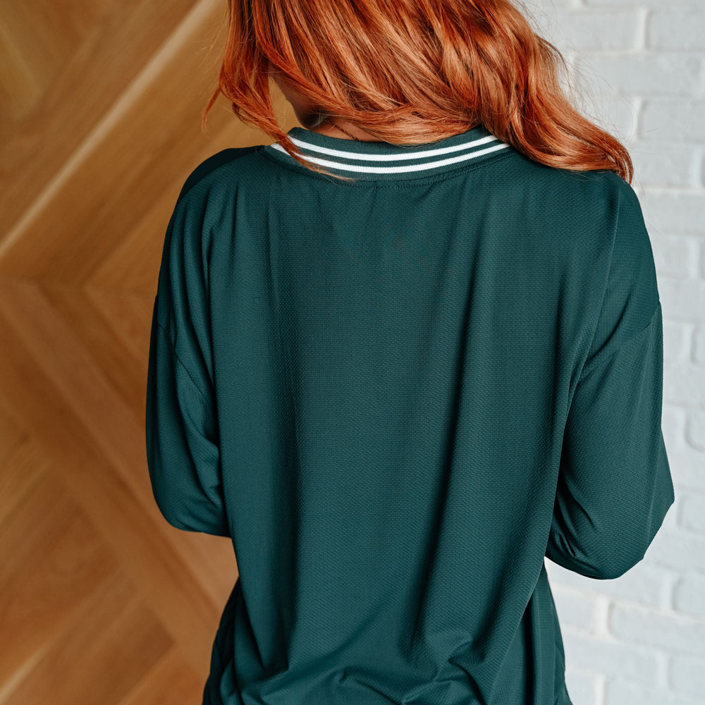 
                      
                        All Out Comfort V-Neck Pullover in Midnight Green
                      
                    