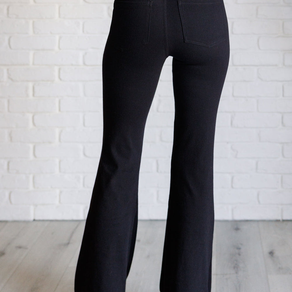 
                      
                        Building Habits Twill Flared Crossover Waist Pant in Black
                      
                    