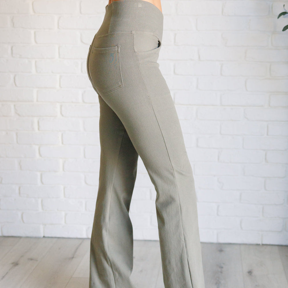 
                      
                        Building Habits Twill Flared Crossover Waist Pant in Dusty Olive
                      
                    