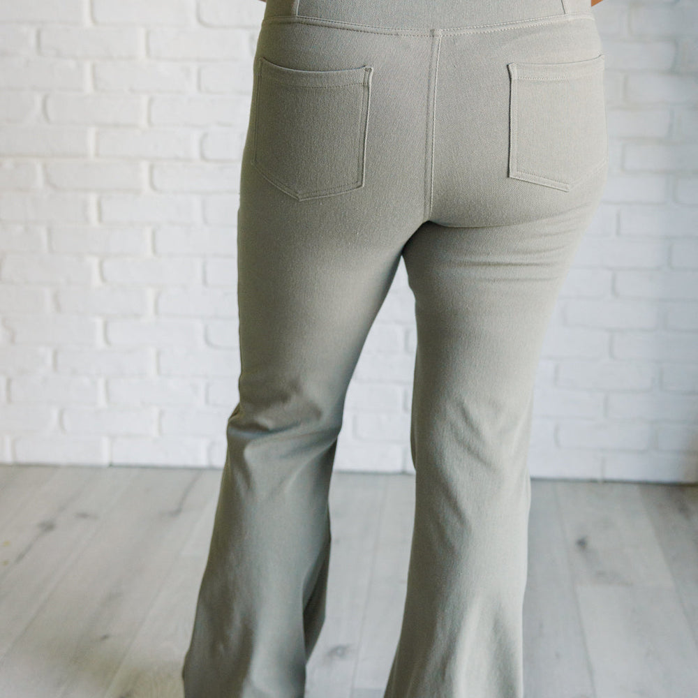 
                      
                        Building Habits Twill Flared Crossover Waist Pant in Dusty Olive
                      
                    