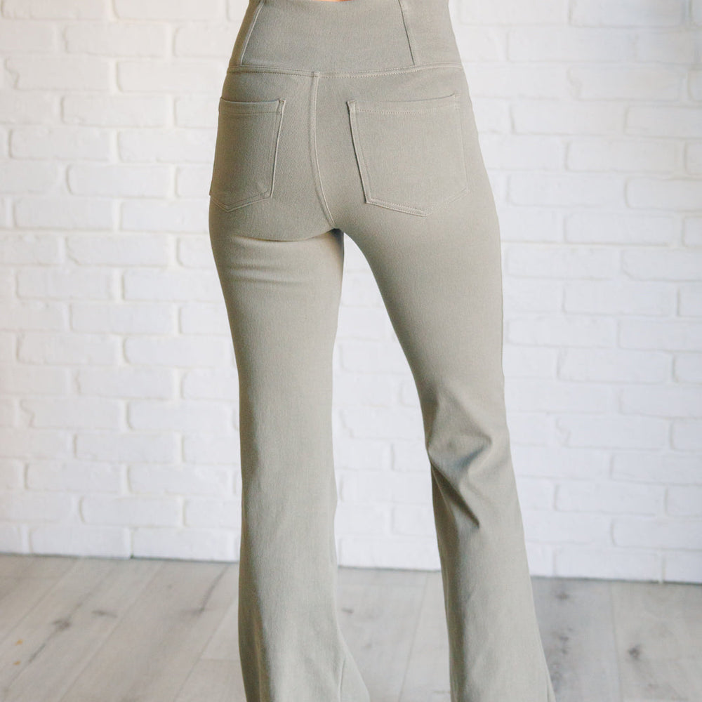 
                      
                        Building Habits Twill Flared Crossover Waist Pant in Dusty Olive
                      
                    