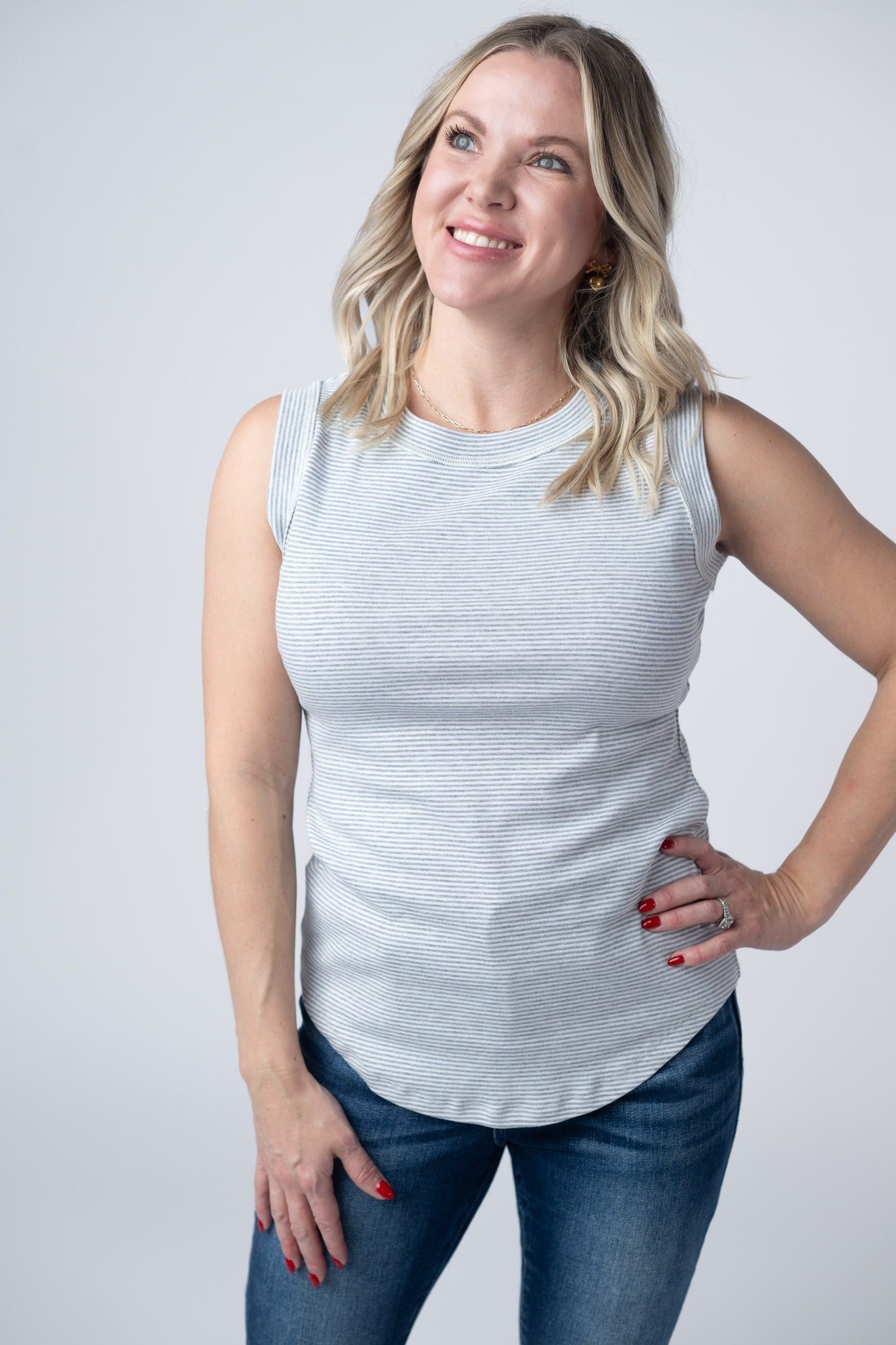 Women's micro striped tank top in Grey and white with scoop neckline, exposed stitch trim, and fitted silhouette