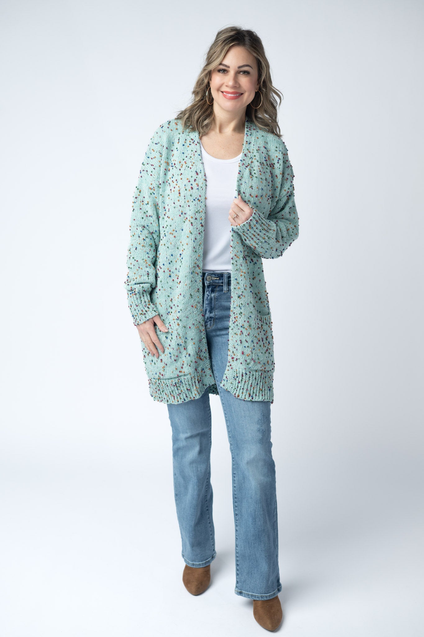 Women's confetti dot cardigan in Aqua Blue with colorful confetti speckles, open front, front pockets, and ribbed trim