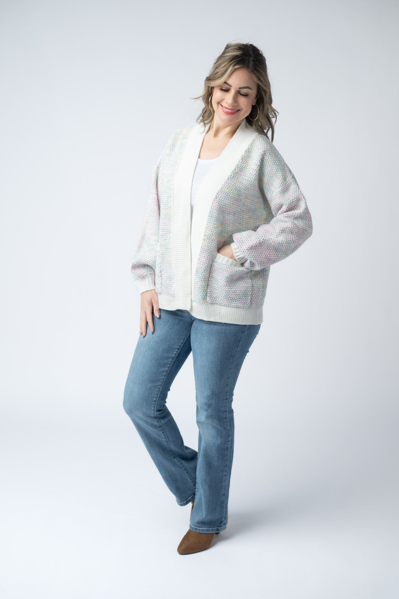 Women's open front cardigan in Bright Pastel Mix with cream base, multicolor pastel textured knit, front pockets, and relaxed fit