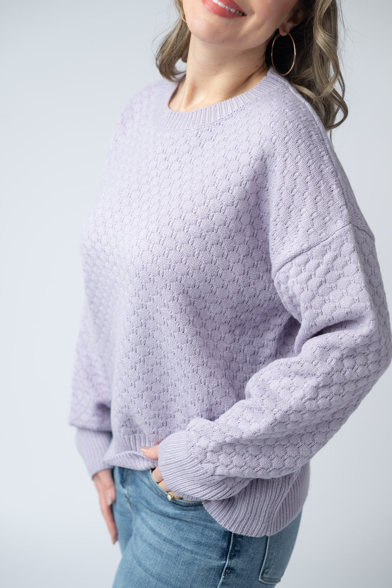 Women's textured pullover sweater in Lavender with crew neck, honeycomb knit pattern, and ribbed cuffs and hem