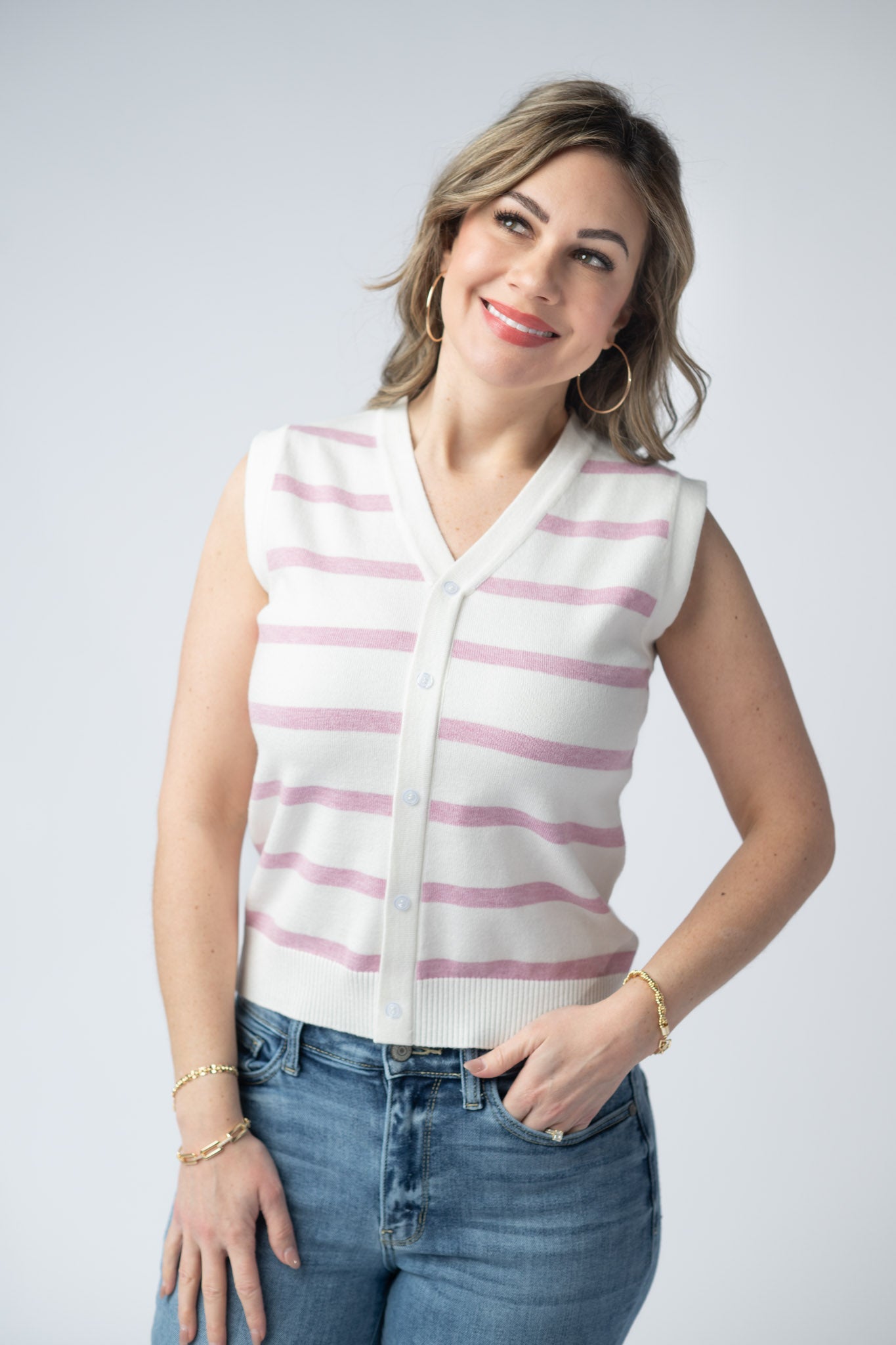 Women's striped button tank in Pink and white with v-neck, decorative faux button front, and ribbed hem